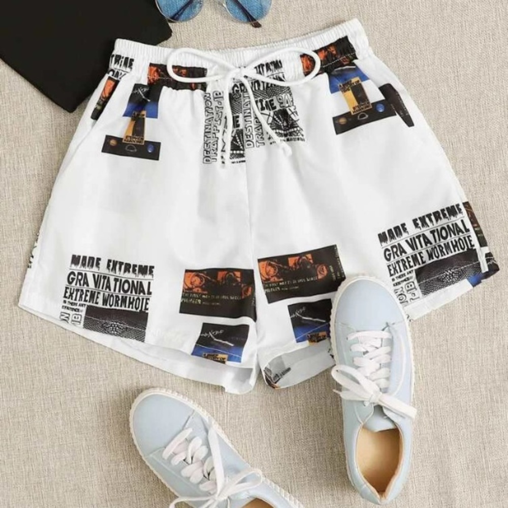 Newspaper print slant pocket drawstring pants